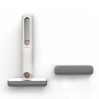 White handheld vacuum cleaner with gray spomge