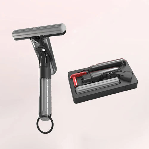 Gray cleaning tool with attachments on a light pink background